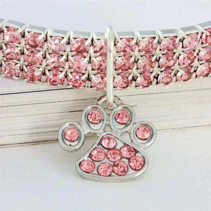 Pretty Kitty's Paw Pendant Cat Collar with pink rhinestone rows, silver-toned setting and a sparkling paw-shaped pendant