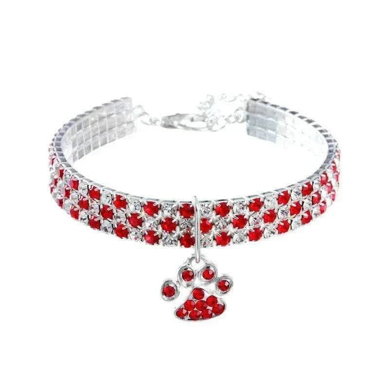 Pretty Kitty's Paw Pendant Cat Collar in silver with rows of red rhinestones and a matching dangling paw charm