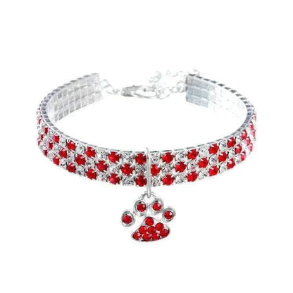 Pretty Kitty's Paw Pendant Cat Collar in silver with rows of red rhinestones and a matching dangling paw charm