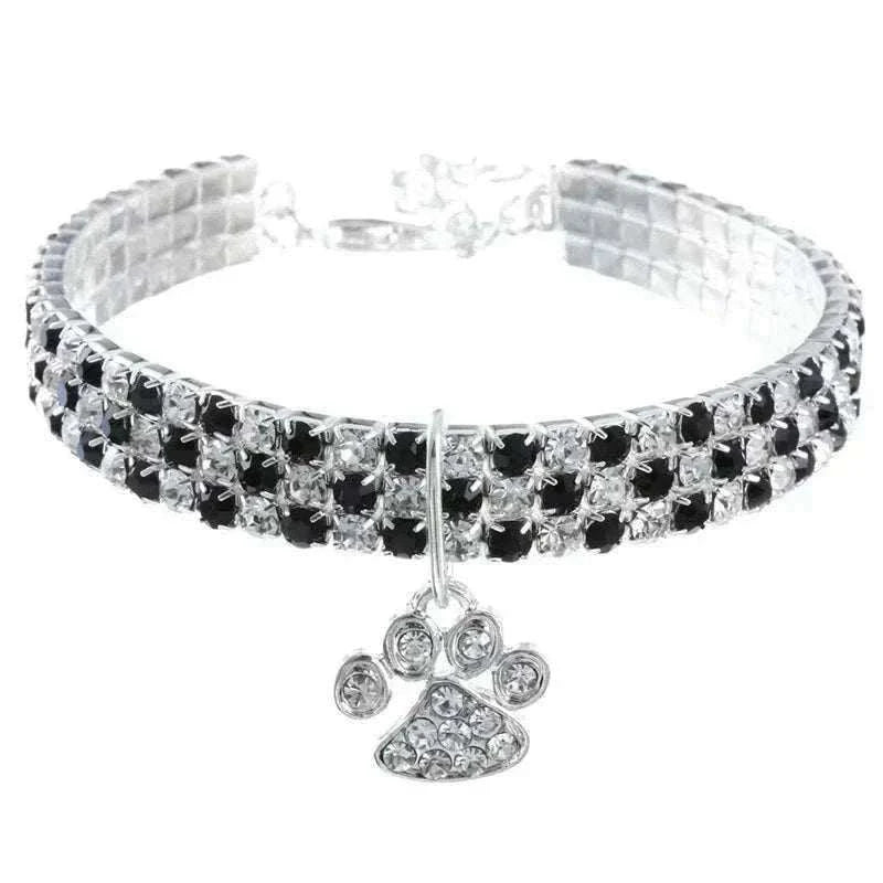 Pretty Kitty's Paw Pendant Cat Collar in silver-tone metal with rows of clear and black rhinestones and a sparkling paw charm